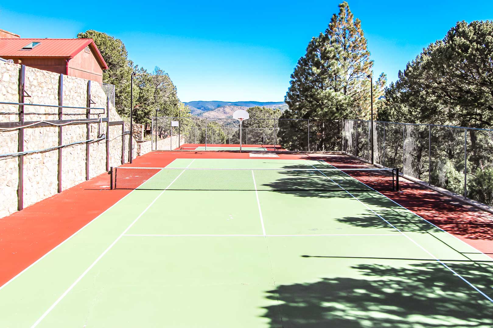An ample view of the tennis courts at VRI's Crown Point Condominiums in New Mexico.